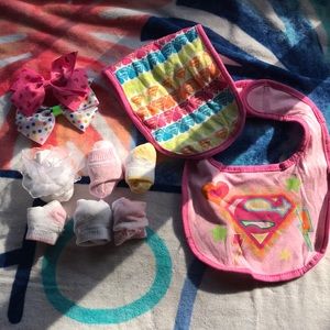 Six pairs never used baby girl socks